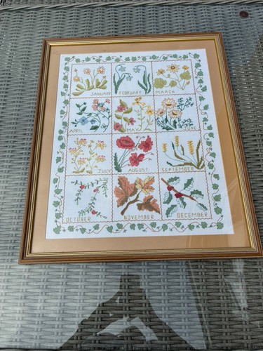 Framed hand stitched - hand,