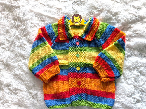 Hand knitted rainbow coloured - knitted,