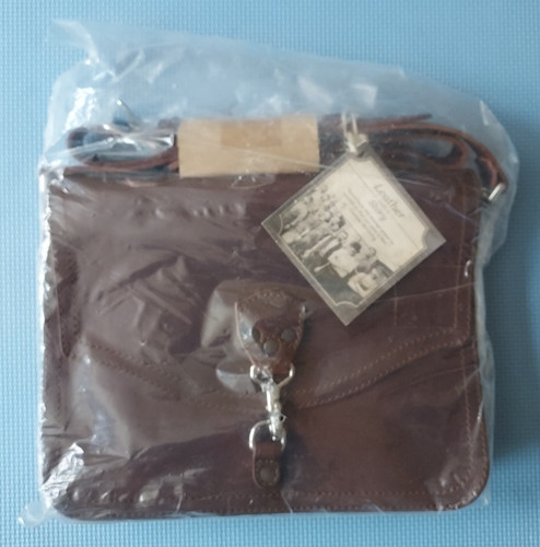 New never opened - new,, saddleback