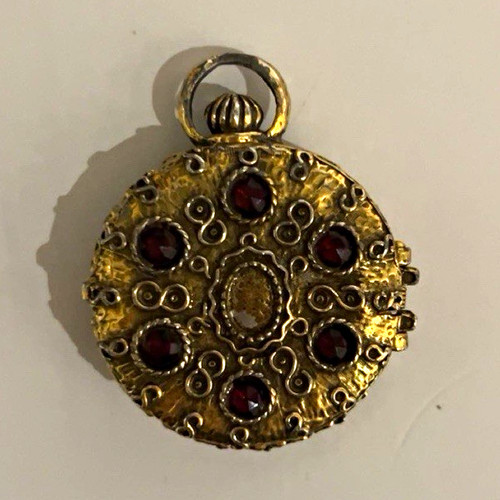 Antique gold toned locket - toned, with