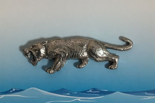 Sabre tooth tiger - tooth,
