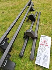 Car roof bars, Thule for Focus, Escort or Megane.  Fit doors not flush bar.