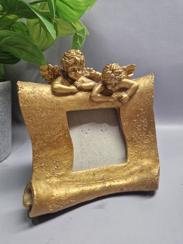 Gold ornate cherub scroll - cherub,