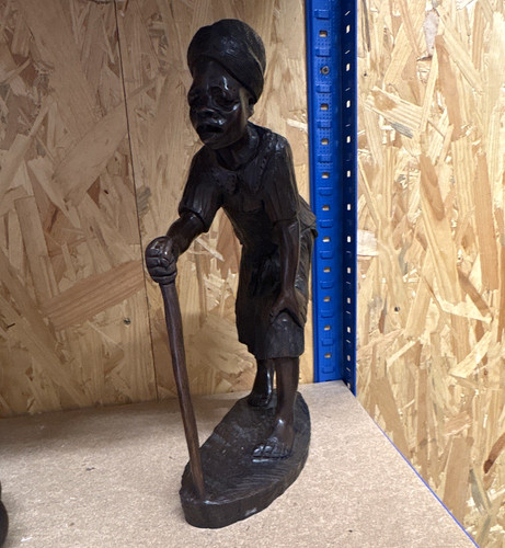 Hand carved brown wooden man - brown,