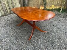 Antique reproduction inlaid Yew wood twin pedestal extendable dining table 