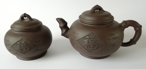 Yixing oriental teapot and tea - oriental,