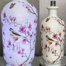 Glittered, decoupaged and lit up-cycled spirit bottles personalised if required