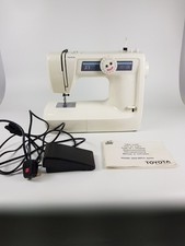 Toyota Electric KB13 RS2000 Sewing Machine With Pedal And Instruction Book.