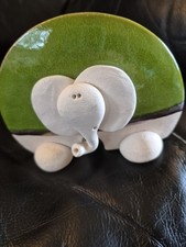 Flat Green Glazed Pottery Elephant Trunk Up Figurine