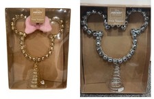 Mickey or Minnie Mouse