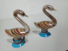 Swans, coloured sand filled swan ornaments