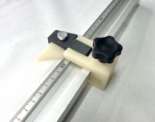Flip over measuring stop - over,