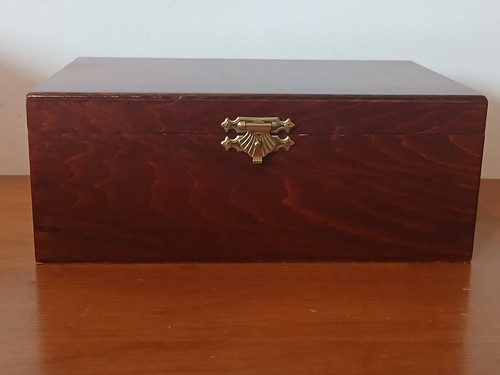 Wooden lidded storage box with