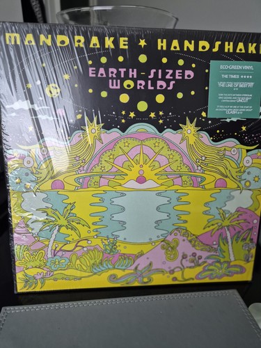 Mandrake handshake earth sized - mandrake, handshake-earth-sized