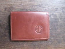 MG logo Brown Leather credit