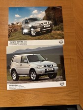 2x Nissan Terrano Van Press
