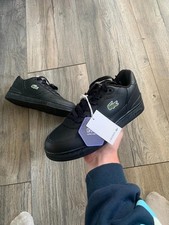 Black Lacoste trainers