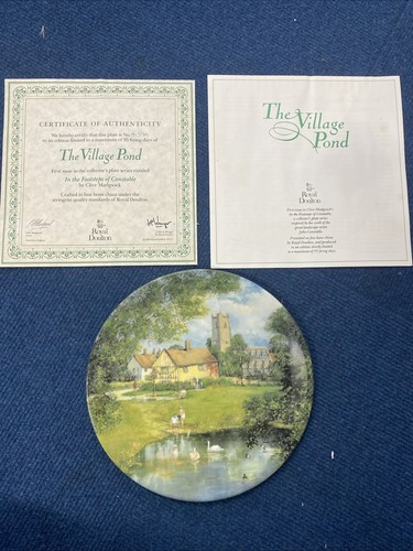 Royal doulton plate village - royal,