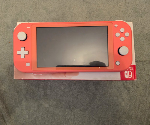 Nintendo switch lite coral - nintendo,