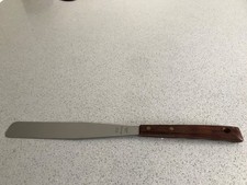 Vintage Prestige palette knife, stainless steel with wooden handle.