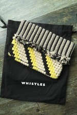 Whistles woven fringed black cream & yellow clutch bag