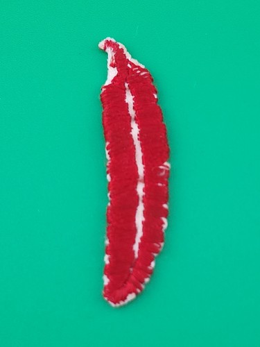 Small red feather patch - red,