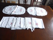 Matching 7 Christmas napkins and seven table mats.