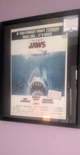 Signed Steven Spielberg's Jaws Movie poster. Framed with COA