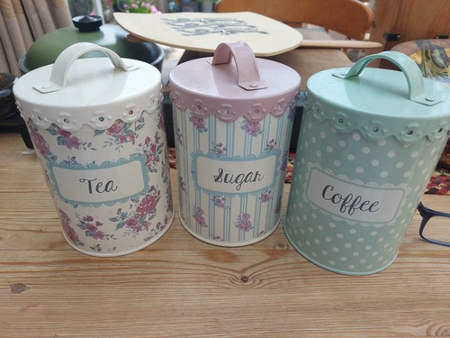 Three canisters tea - three,