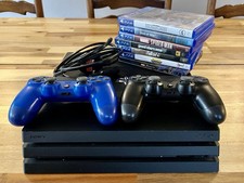 PS4 Pro 1TB Console Bundle – 2 controllers + 7 games inc God of War & Spider-Man