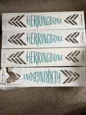 Four Packs Brand New Laminate