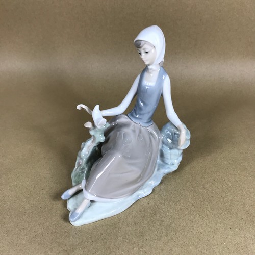 Lladro shepherdess with dove - lladro,