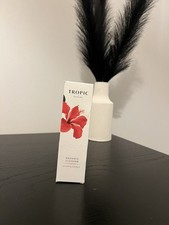 New Tropic Radiance Cleanser Pore-Refining Cleansing Oil 95ml box has a rip
