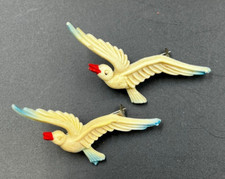 Pair Antique Bakelite Brooches