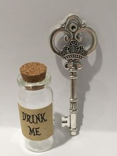 ALICE IN WONDERLAND DRINK ME BOTTLE ,LARGE KEY