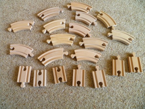 Wooden train track pieces - train,