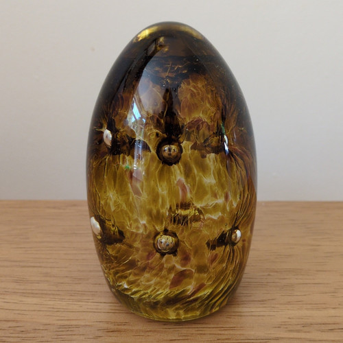 Amber brown art glass egg - brown,