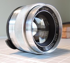 Yashinon 55mm f1.8 Chrome Auto Tomioka lens with hood, Serial No. 538925 - M42