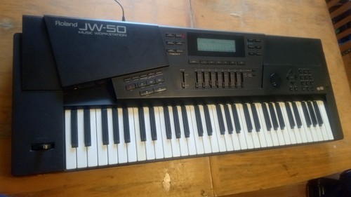 Roland music synthesizer - roland,