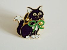 Macmillan cancer relief pin - relief,