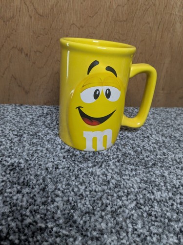 Yellow mug inside - m&ms,
