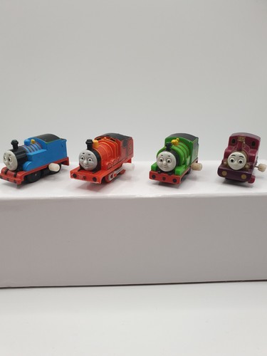Tomy capsule wind up - x,