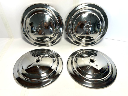 Set four hubcaps - of,