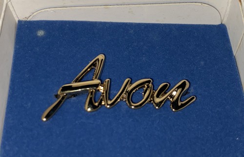 Avon gold toned new - avon,