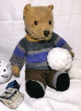 Hand knitted teddy bear