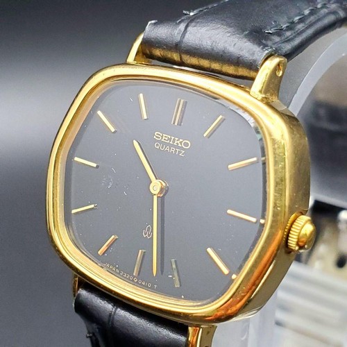 Seiko quartz gold black dial - quartz,