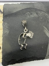 Kokopelli pendant, solid