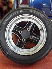 REVOLUTION PLASTIC CENTRE CAPS BLACK 67mm CENTRES (5X12 ALLOYS) X4