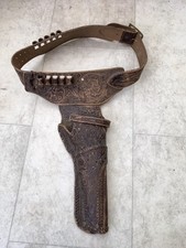 A VINTAGE 1950s TOY GUN HOLSTER, MADE IN UK BY DELUXE TOPPER ORNATELY DECORATED