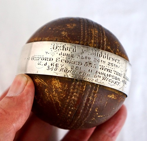 Silver cricket ball trophy - ball,